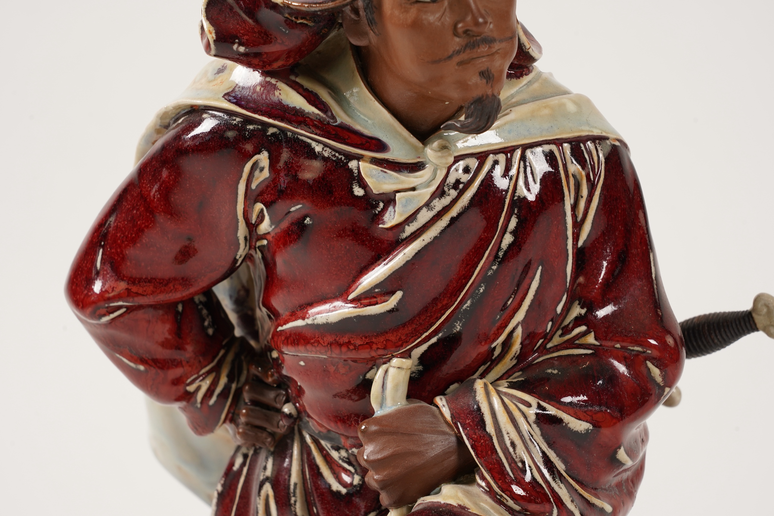 A large Chinese Shiwan stoneware figure of a warrior, 20th century
